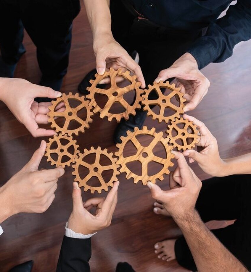 Business team joining cogwheel in circular together symbolize successful group of business partnership and strong collective unity teamwork in community workplace with productive efficiency.